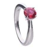 Silver solitaire ring with a ruby zirconia and prong setting