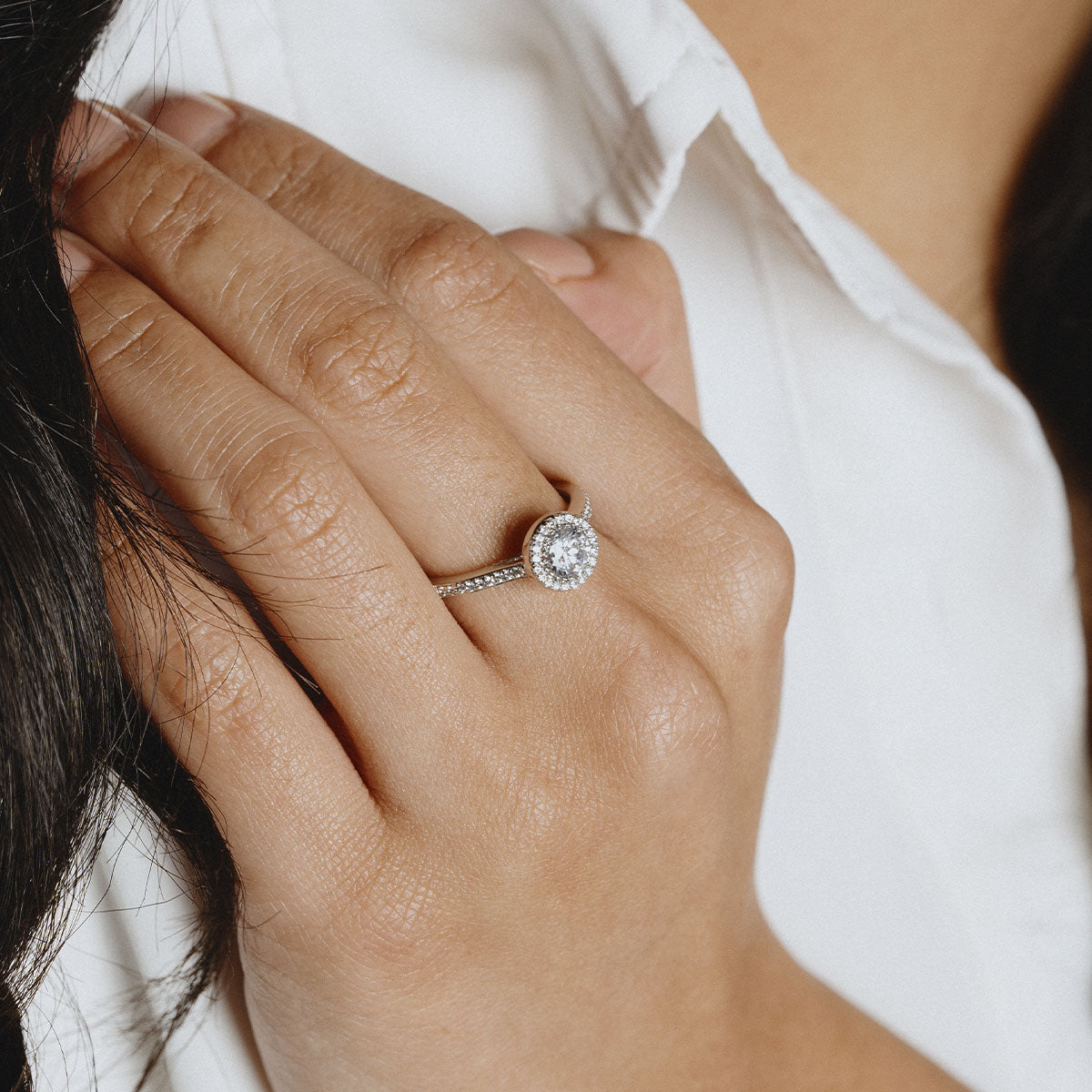 Solitaire ring with stones