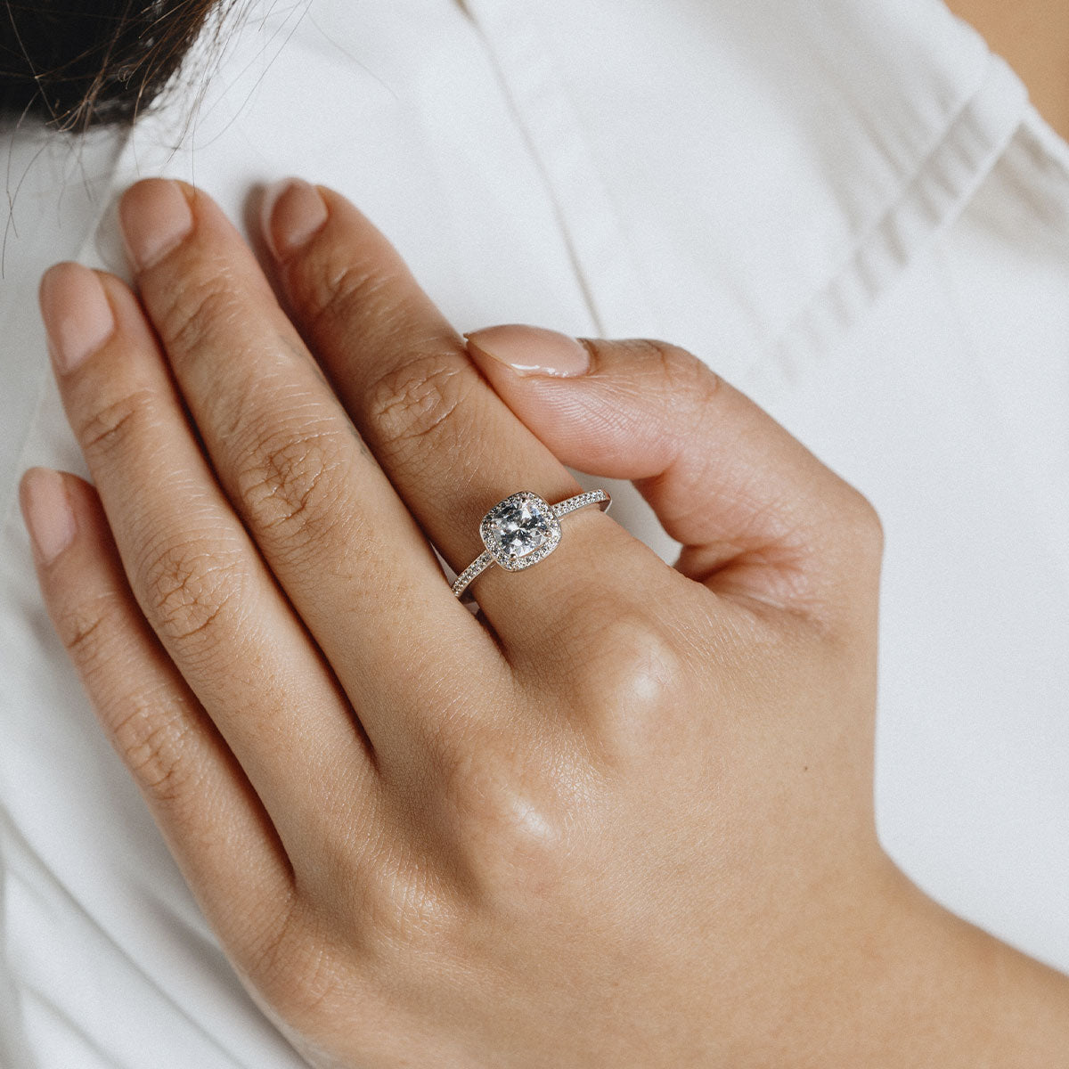 Solitaire square ring with stones