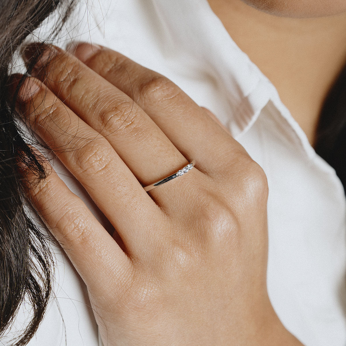 Silver fine ring with 3 white zirconia stones