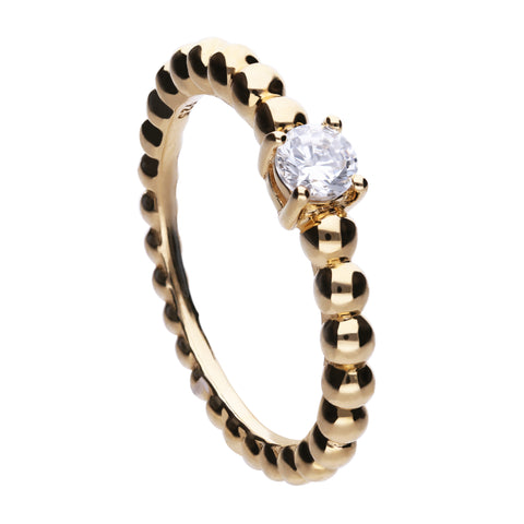 Solitaire golden ring with a zirconia in the middle