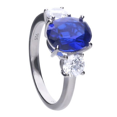 Silver ring with blue oval shaped zirconia and prong setting