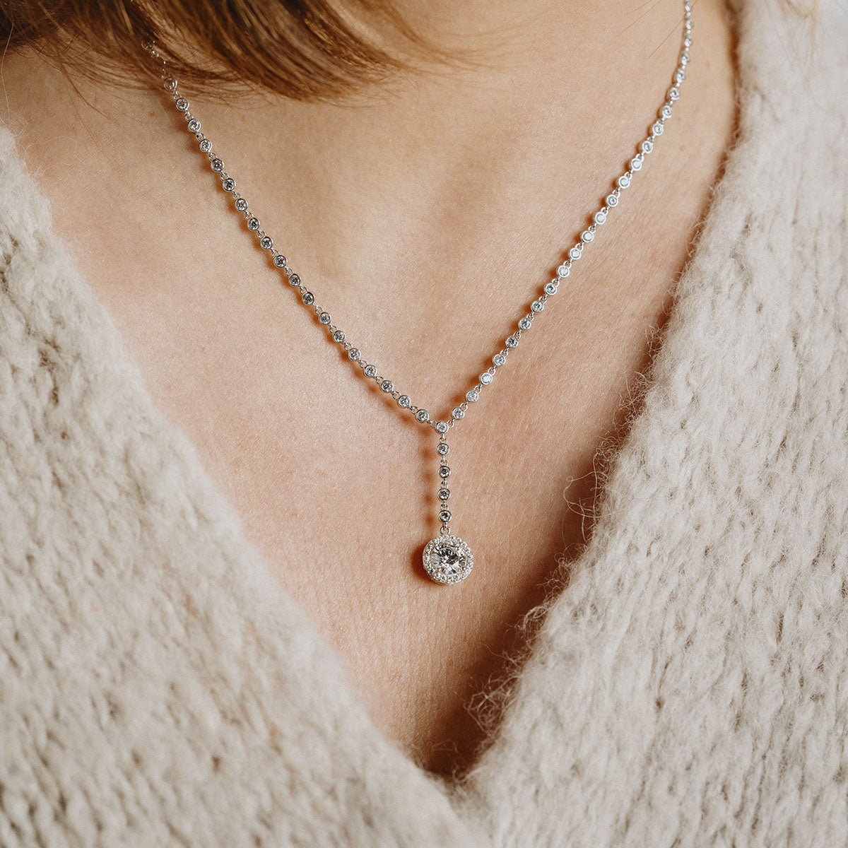 Silver necklace with white zirconia and pave setting