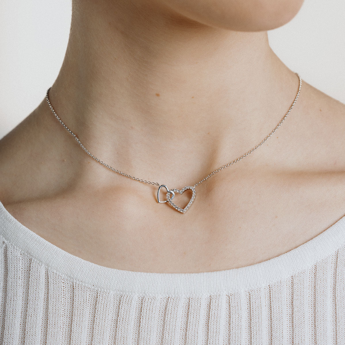 Necklace of two hearts entwined