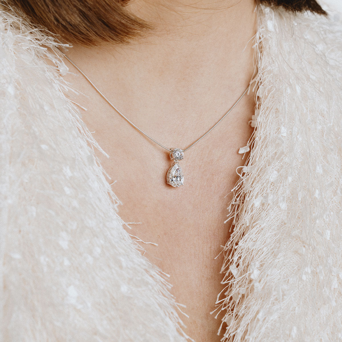 Teardrop silver necklace with white zirconia